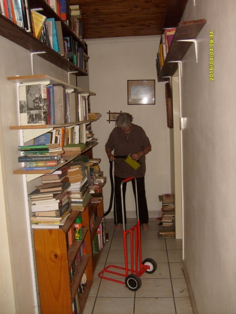 Reshelbing the books in the passage to fit in more shelves